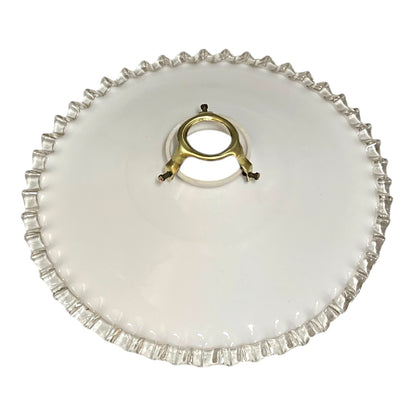 A white glass lampshade with a scalloped edge and gold fixture, perfect for adding a touch of period charm or retro flair to any home, set against a clean white background.