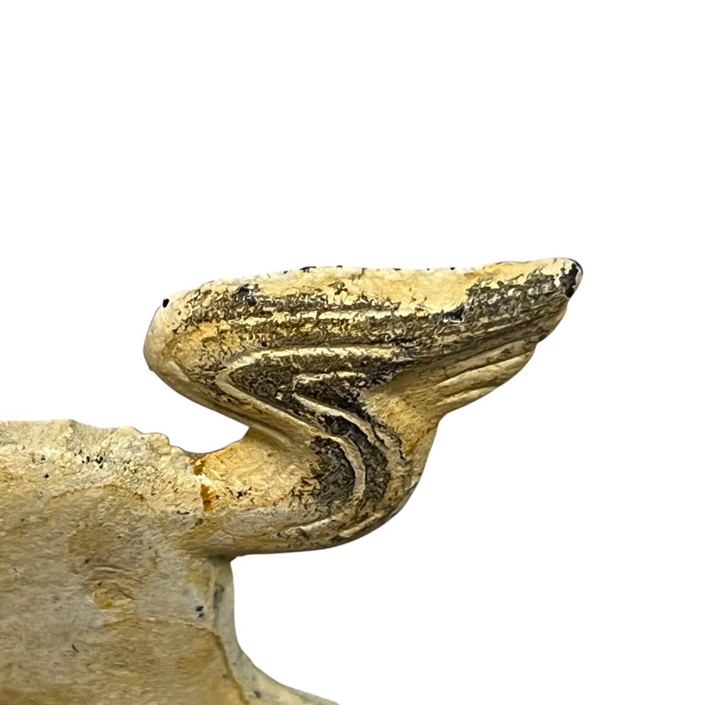 close up of a doorstop on a white background