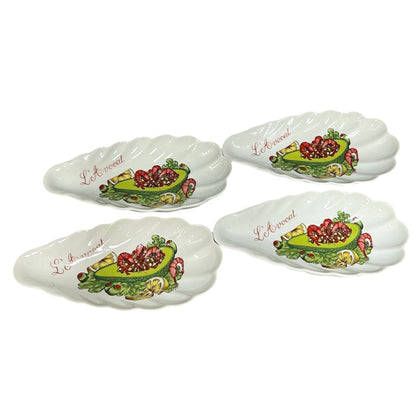 Set of shell-shaped porcelain avocado dishes  decorative designs and 'L'Avocat' branding on a white background.