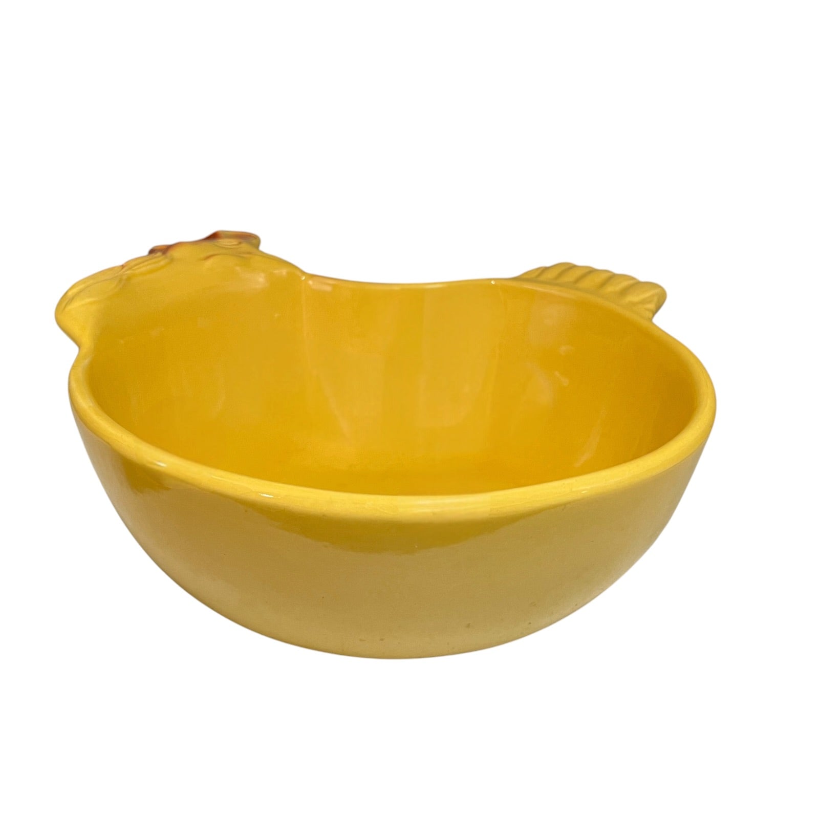 A bright yellow ceramic chicken-shaped bowl with molded handles on both sides, shown against a plain white background.