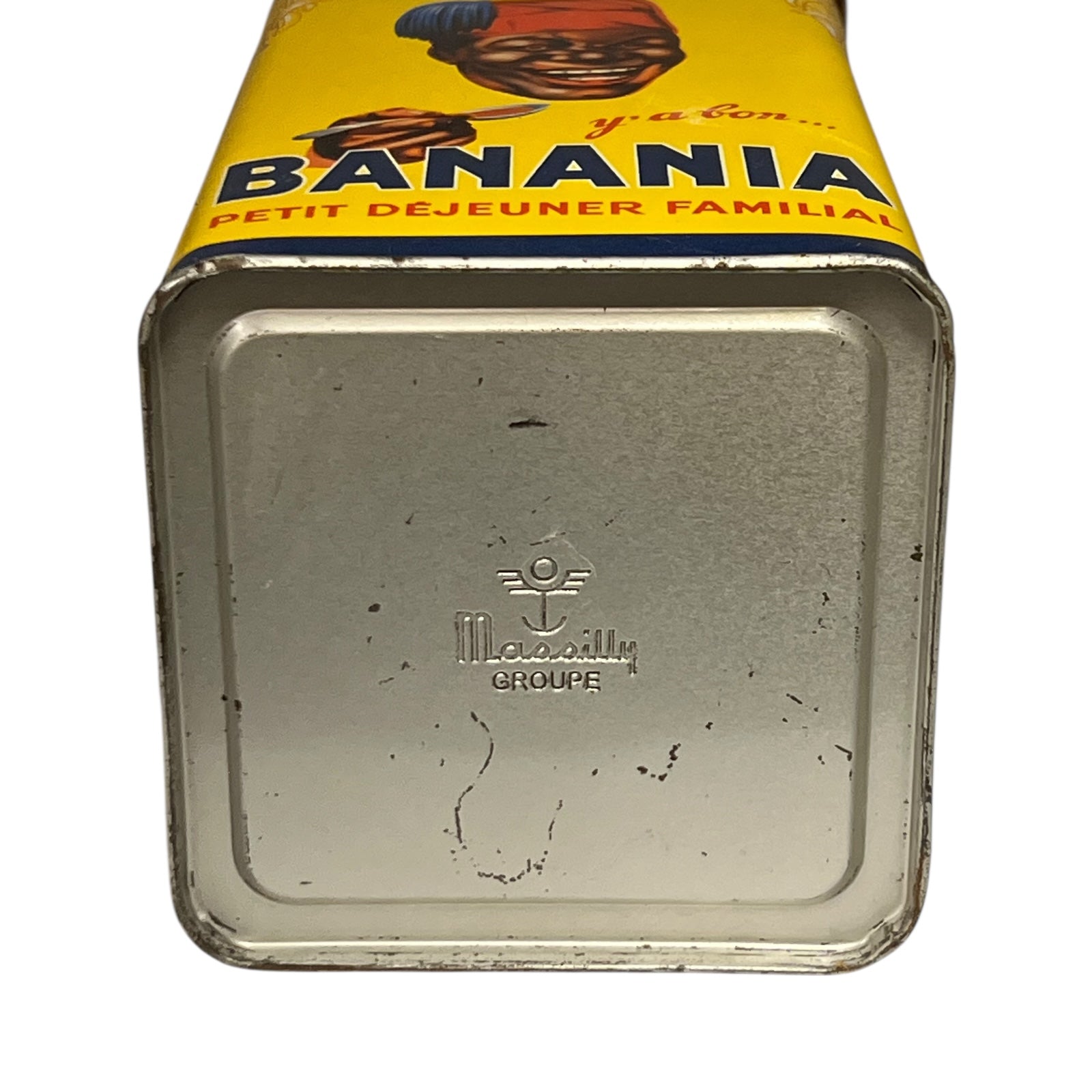 Metal can with 'Banania' branding on a yellow label