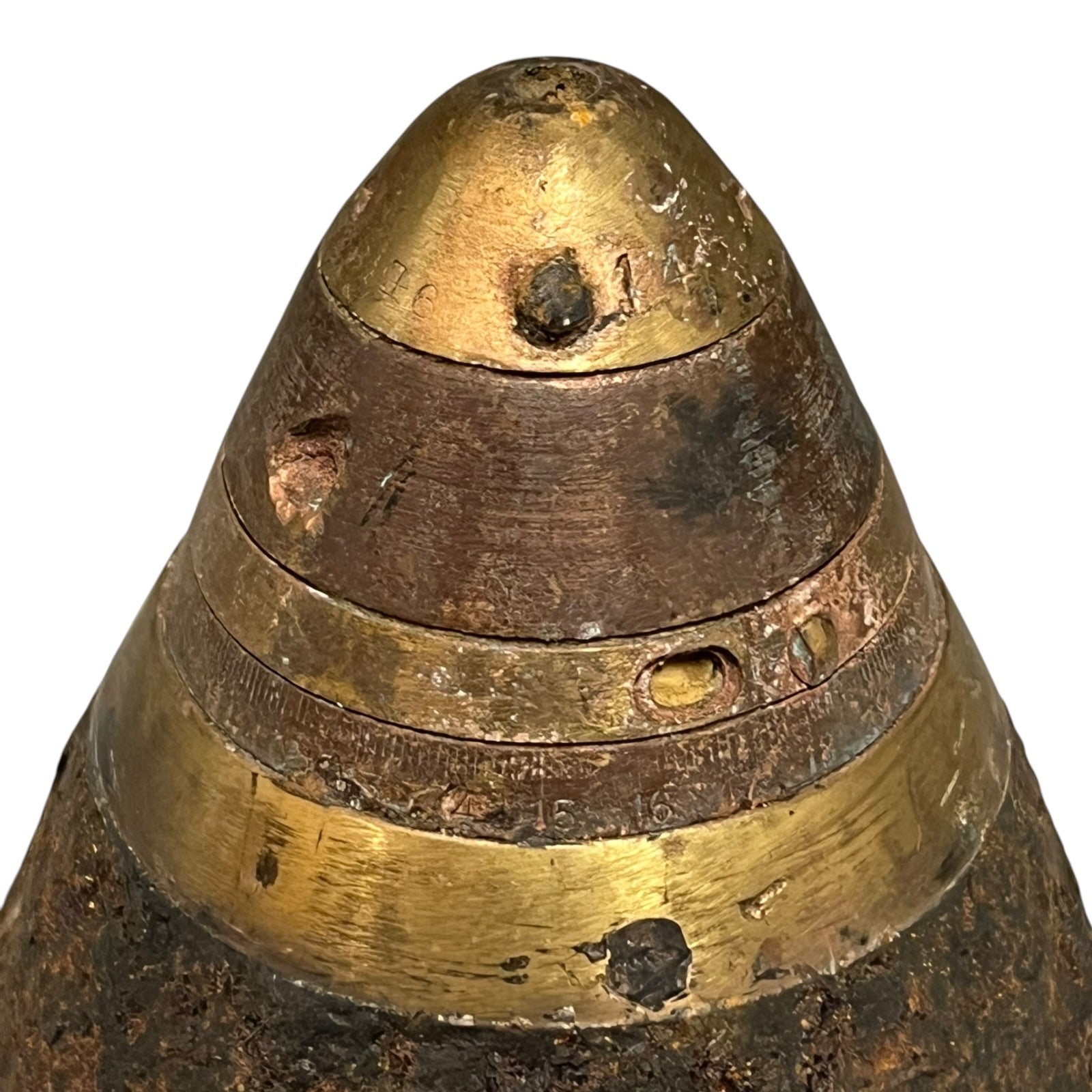 Close up of WW1 brass fuse on a white background