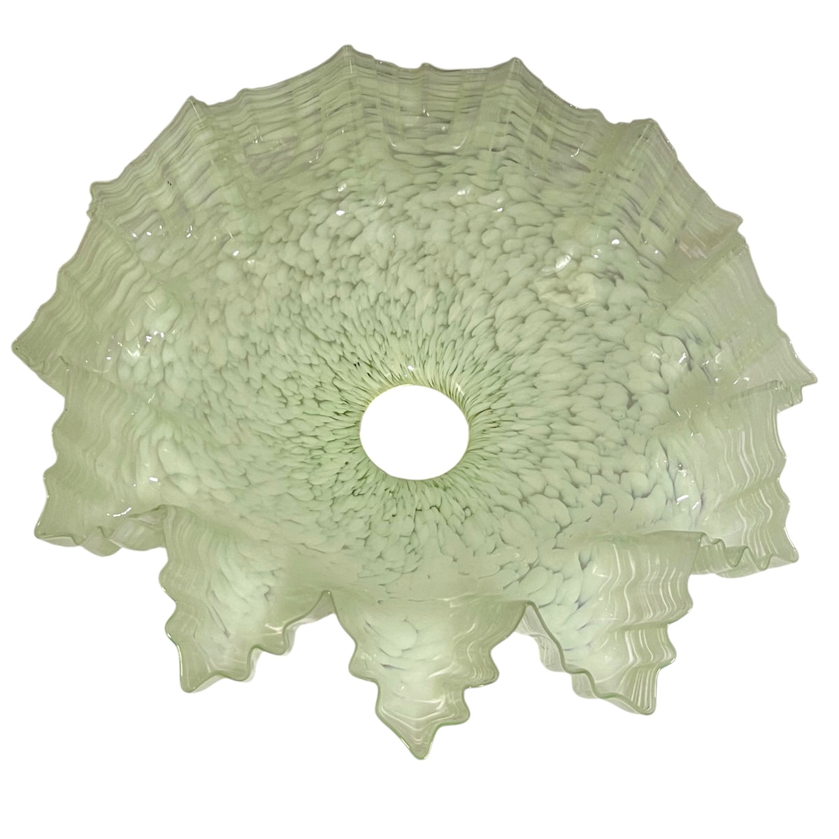 A light green textured glass shade or bowl with a scalloped, ruffled edge and a circular cutout in the center, shown against a plain white background.