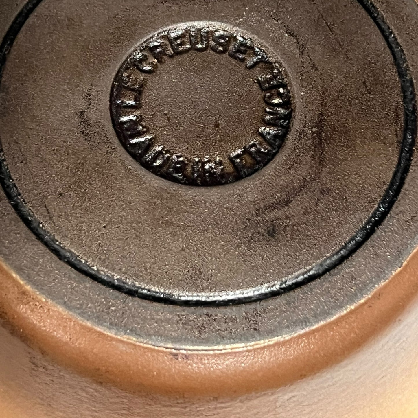 Close up of Le Creuset pan on a white background