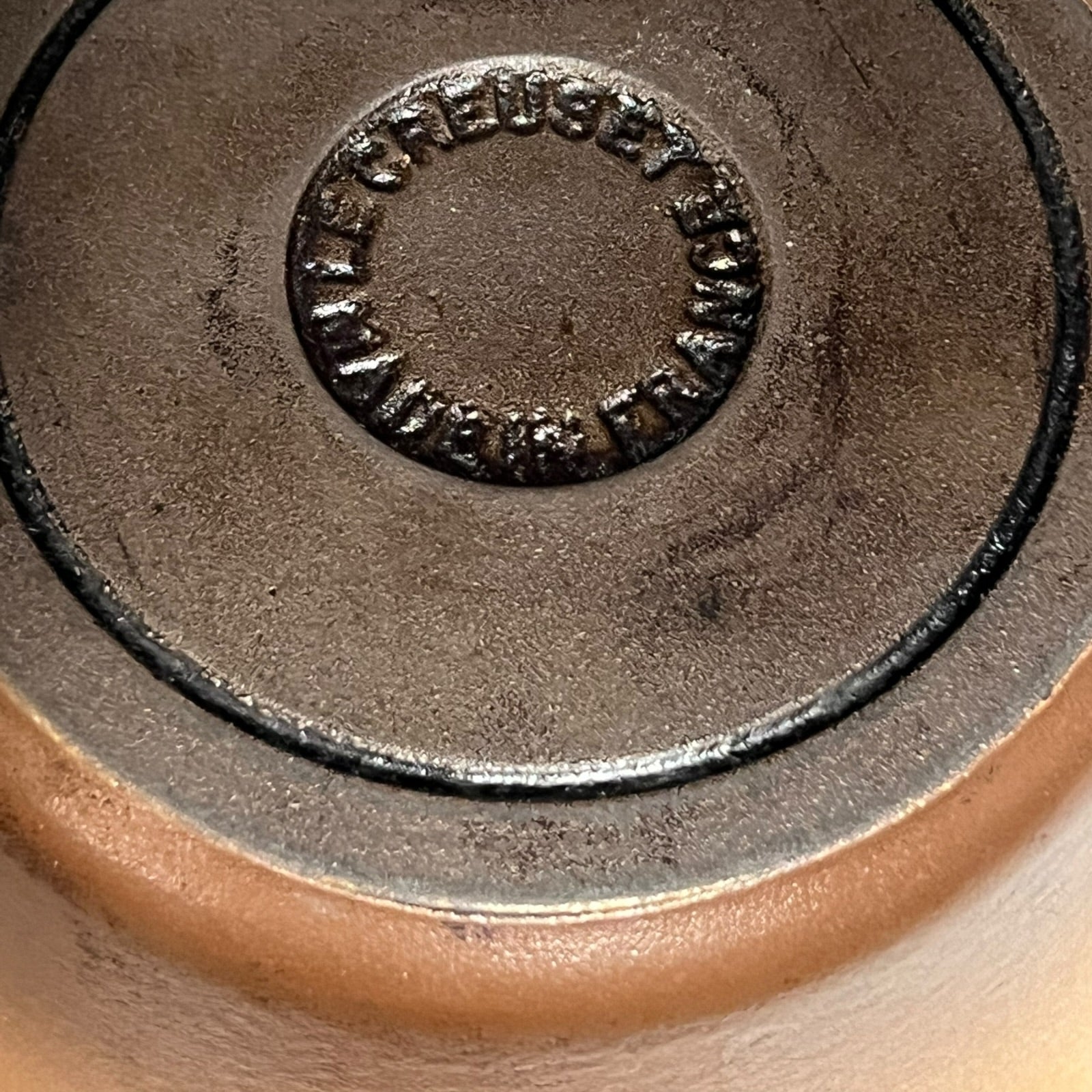 Close up of Le Creuset pan on a white background