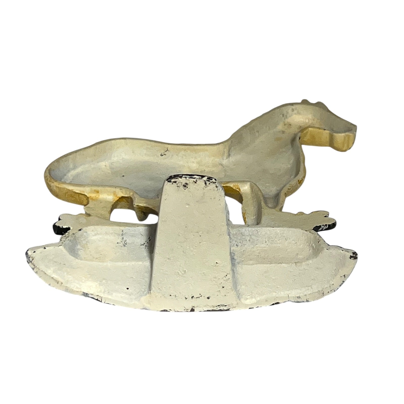 A vintage cast iron rocking horse planter, featuring a white-painted body with gold-toned painted accents on the horse's head and legs, set against a plain white background.
