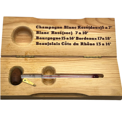 Wooden wine thermometer with measurement markings on a white background