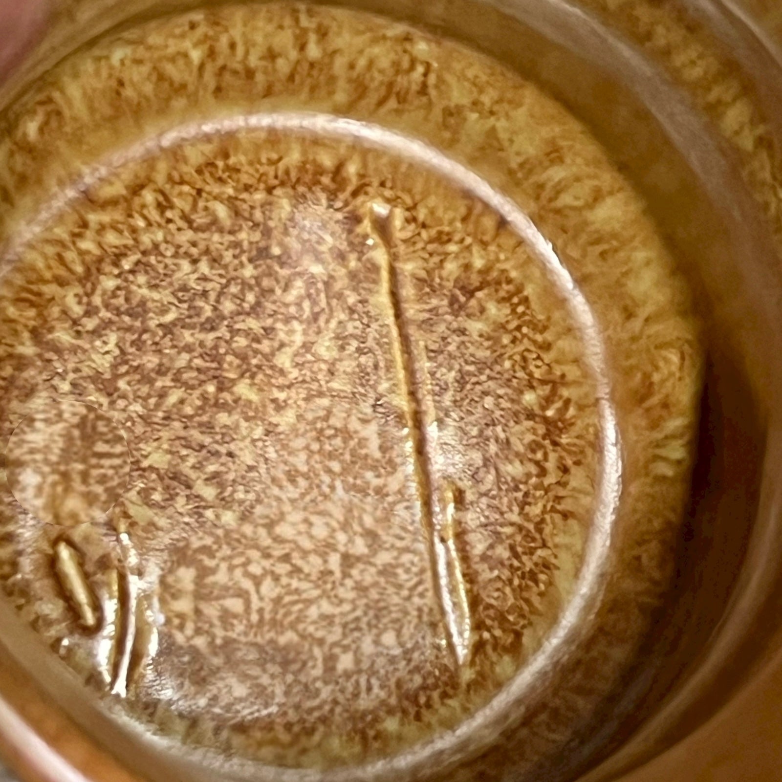 close up of jam jar on a white background