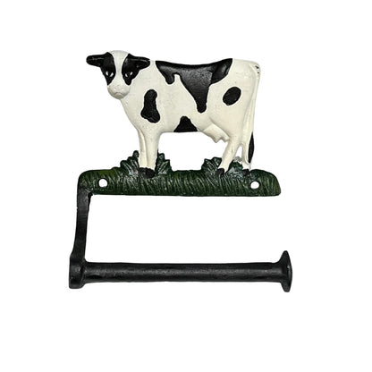 Cow-shaped toilet paper holder on a white background