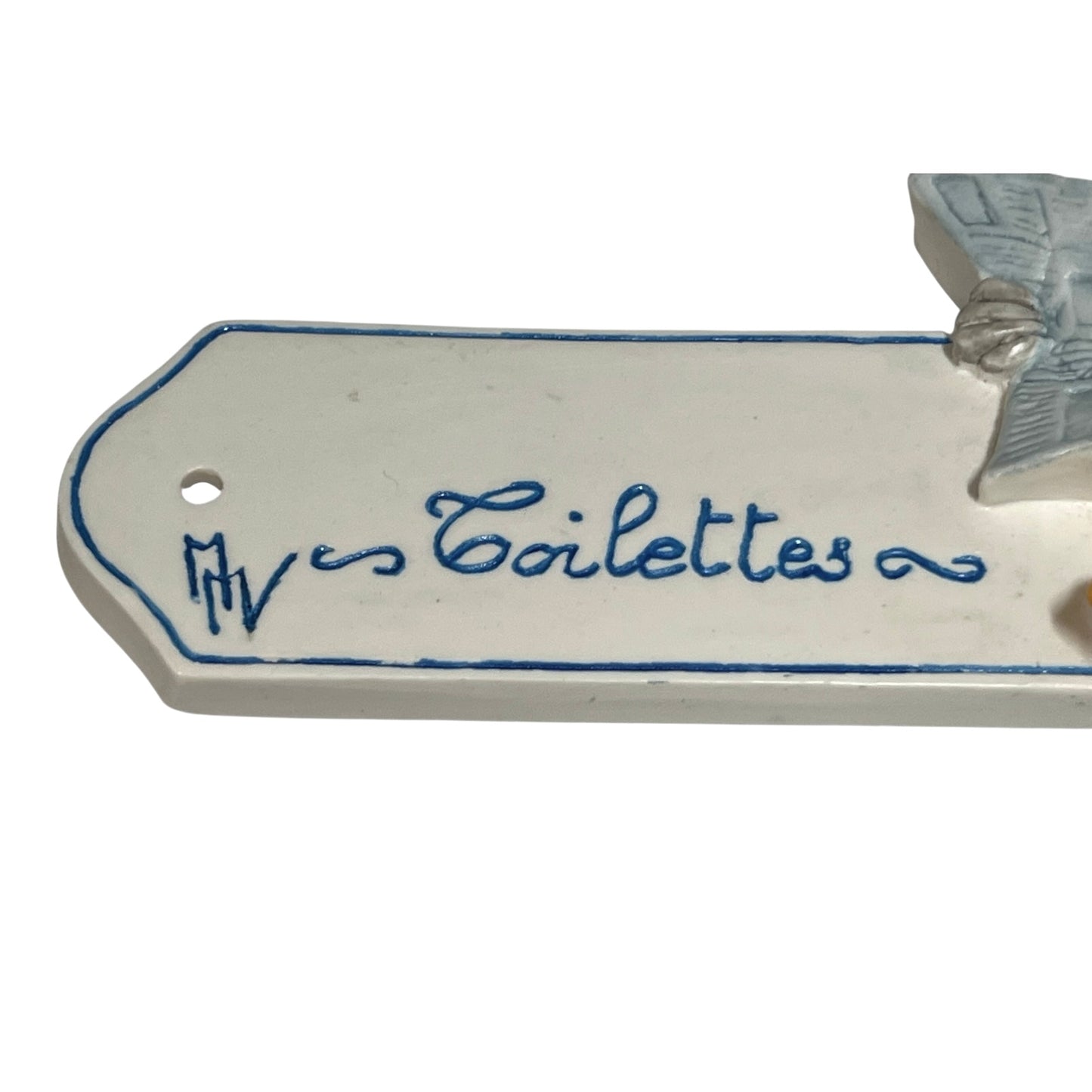 Decorative novelty door sign for a toilet labelled in French as Toilettes, with a goose reading a newspaper  decoration on a white background
