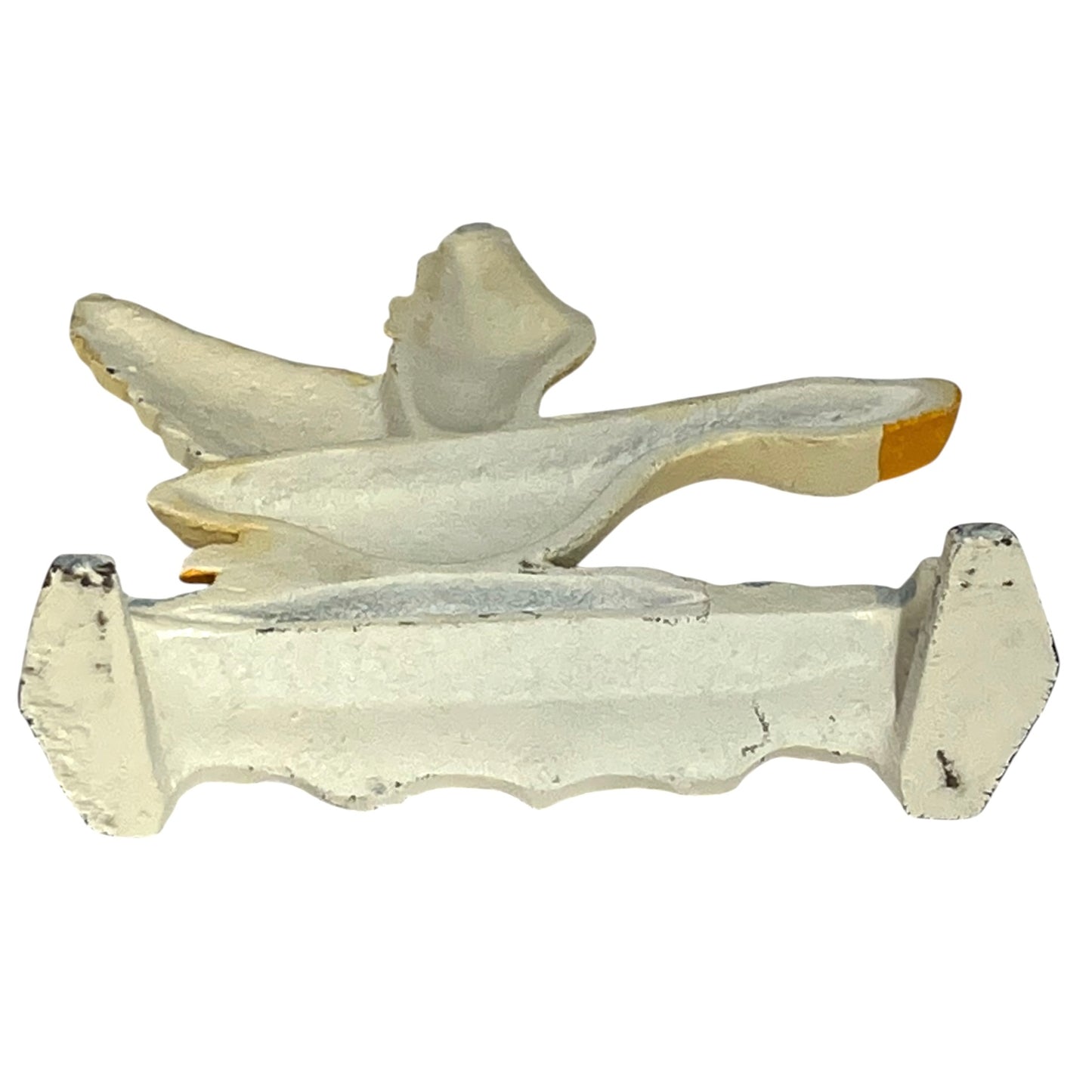 A vintage white-painted metal bird-shaped ornament or decorative piece, shown against a plain white background.