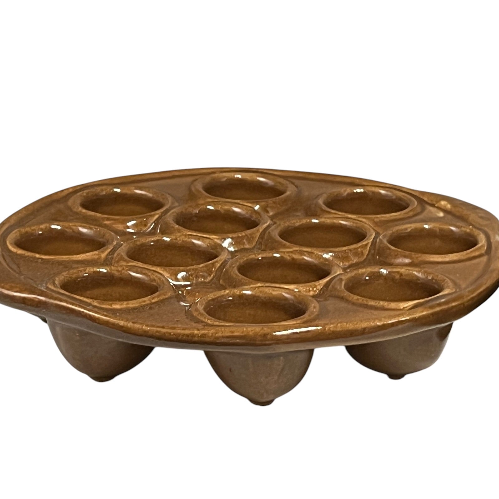 brown French vintage ceramic escargot plate,  featuring 12 holes and side handles, perfect for French recipes or adding charm to a farmhouse country kitchen, displayed on a white background.