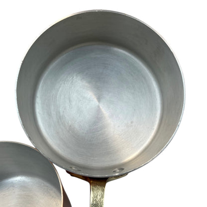 rim of aluminium lined copper pan