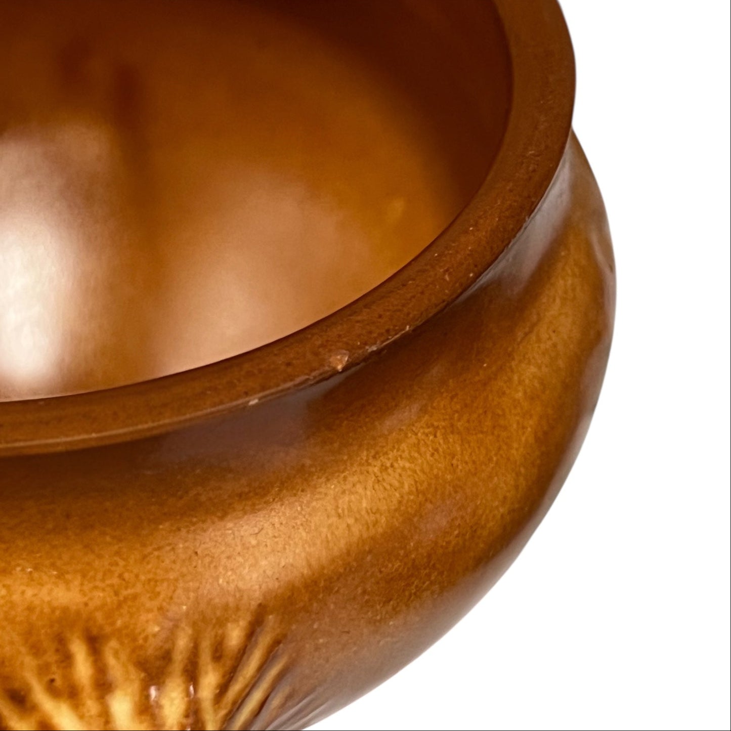 close up of soup bowl rim on a white background