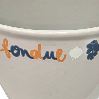 Close up of fondue pan on a white background