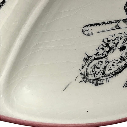 Close-up of a vintage fondue plate with detailed design on a white background
