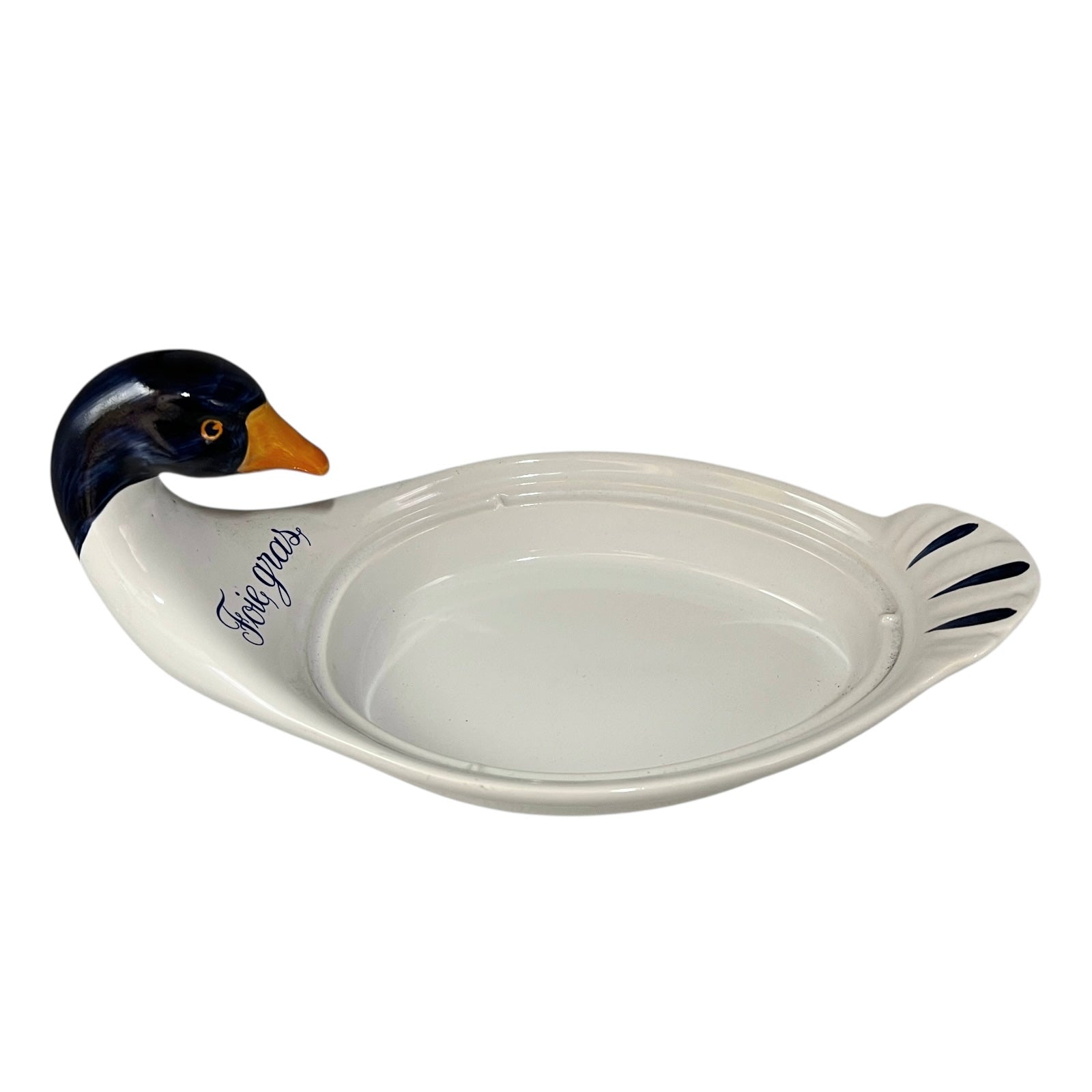 Ceramic dish shaped like a duck with Foie Gras' text on a white background