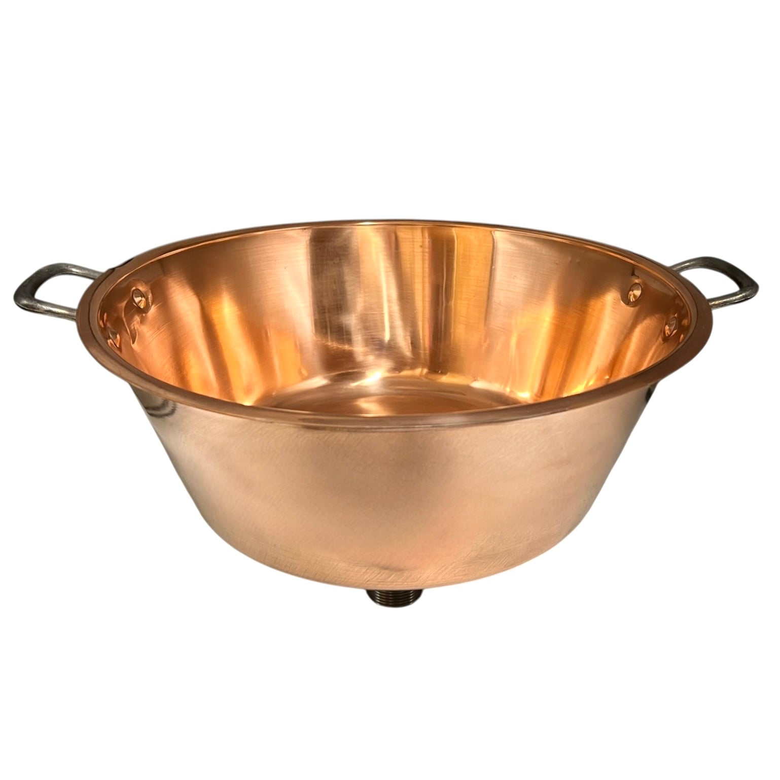 Close up of a French copper bathroom basin on a white background