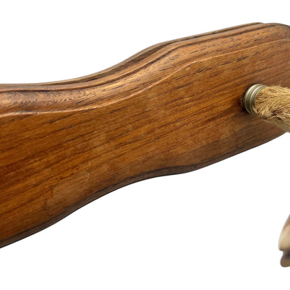 Close up of  French vintage deer hooves on a 2 wooden mounts, ideal for coat hooks - on a white background
