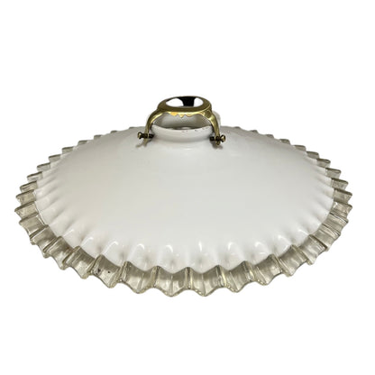 French vintage milk glass opaline lampshade with a frilled edge and brass collar, set against a white background, perfect for adding charm to a vintage-style period home.