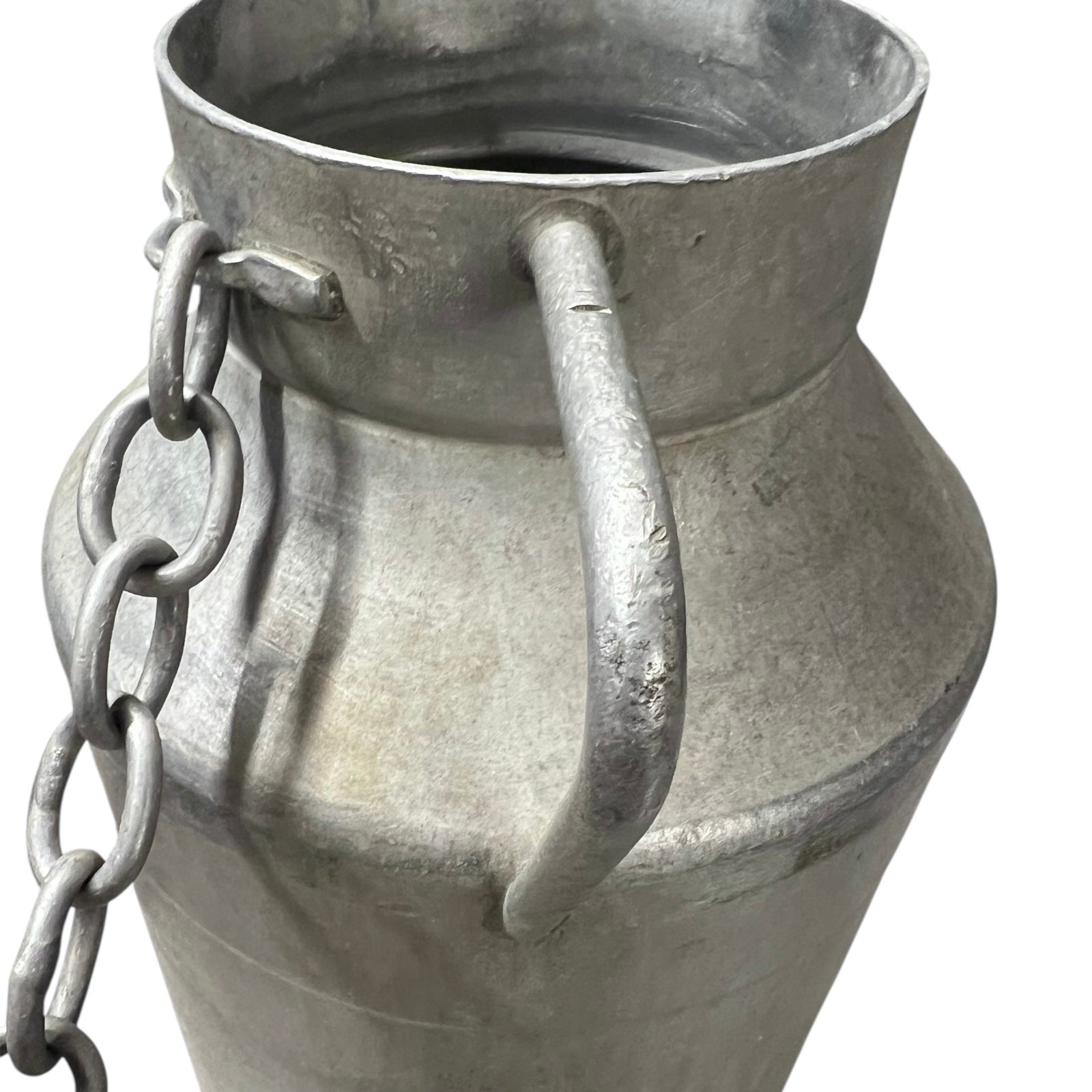 Metal churn with handle and chain on a white background
