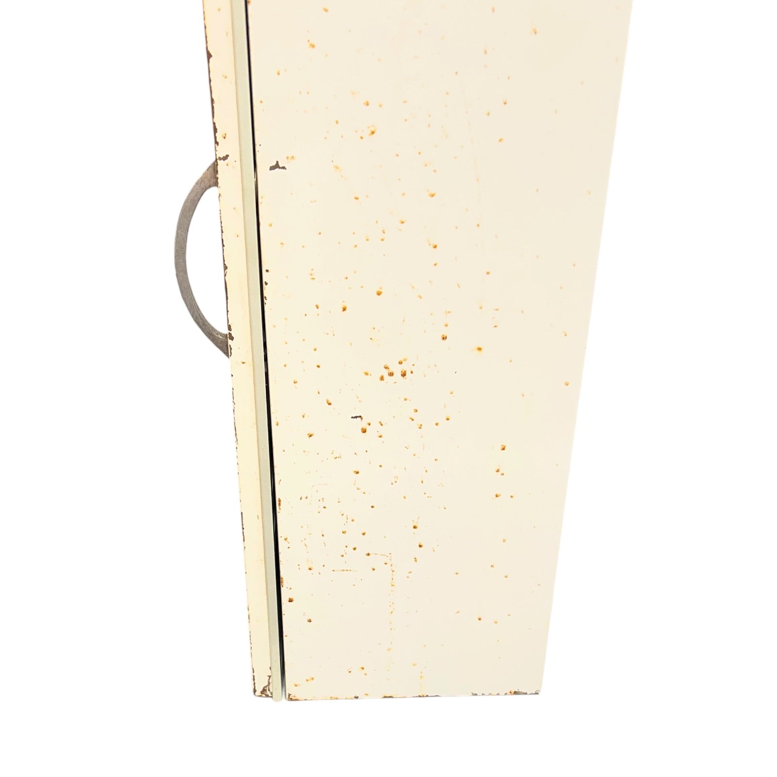 close up of a vintage metal bathroom cabinet on a white background
