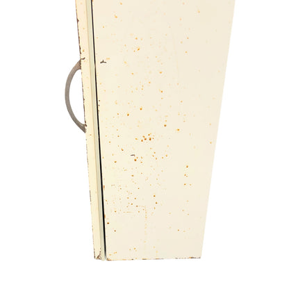 close up of a vintage metal bathroom cabinet on a white background