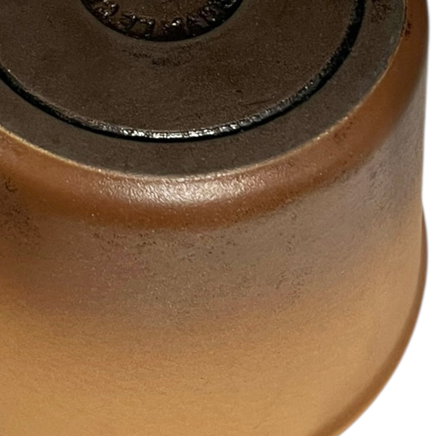 Close up of Le Creuset pan on a white background