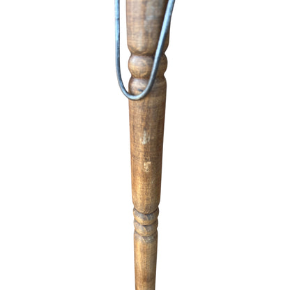 wooden handle of copper ladle