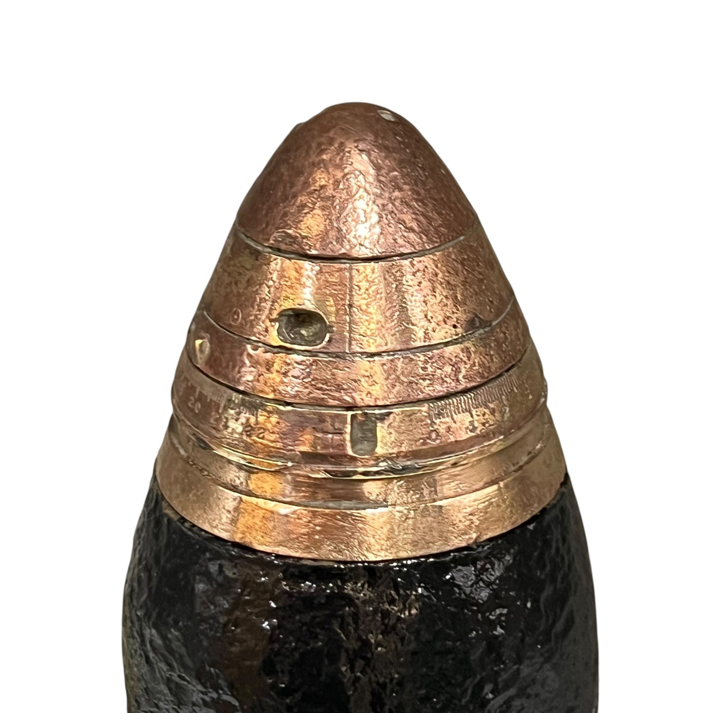 Brass fuse on a WW1 18 pounder on a white background 