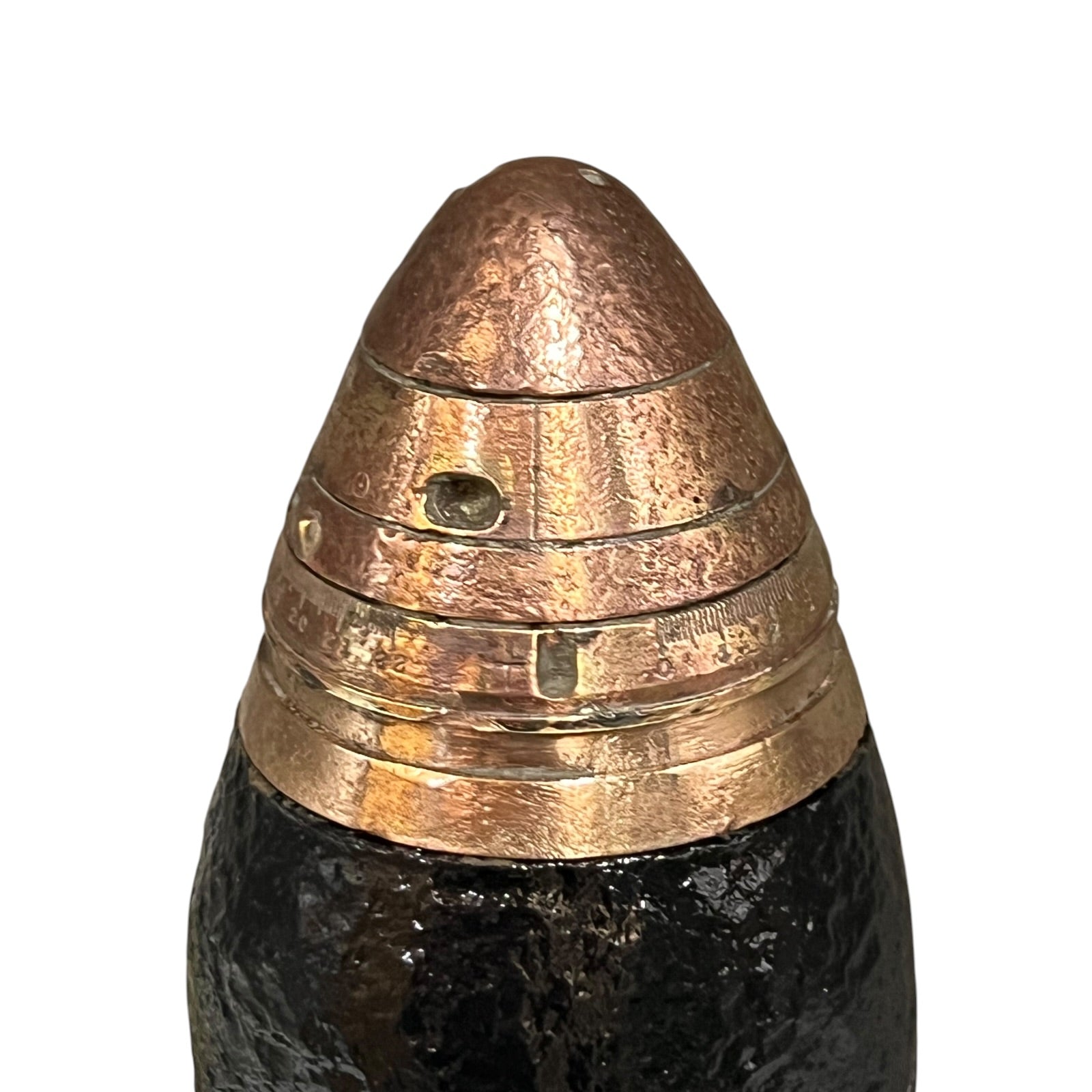 Brass fuse on a WW1 18 pounder on a white background 