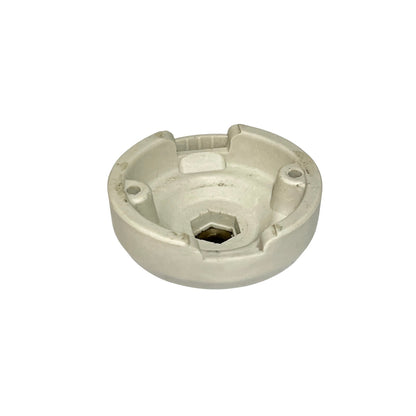 close up of the underside of a light fitting on a white background 