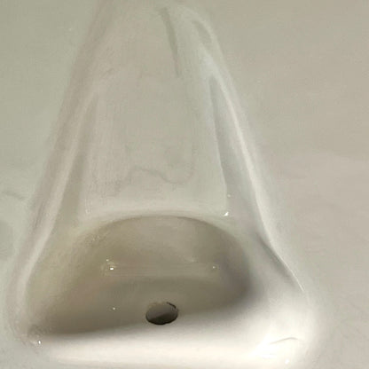 White ceramic shelf on a white background