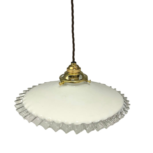 Vintage-style pendant light with white glass shade and brass fitting on a white background