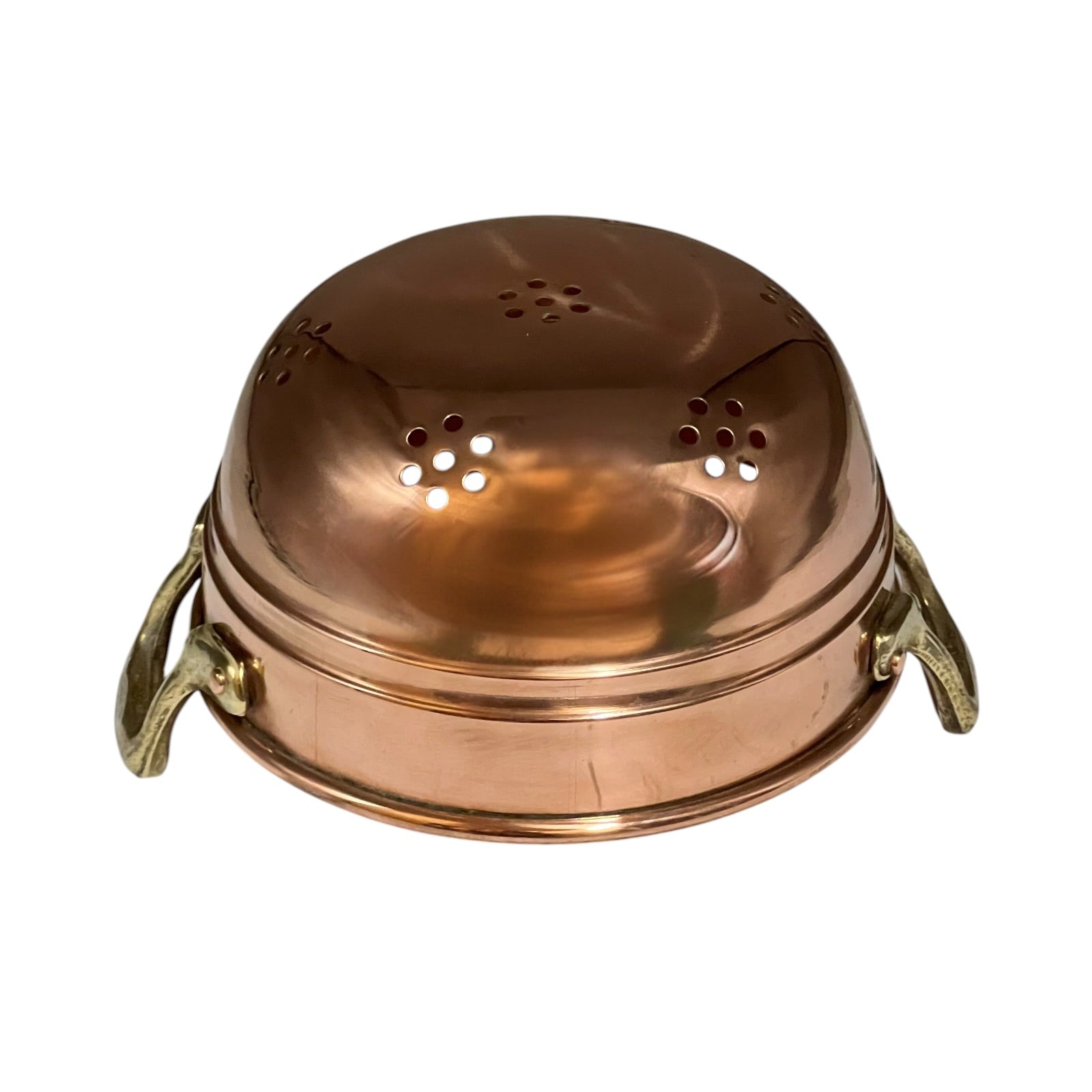 A copper colander with a domed lid featuring multiple drainage holes and two brass side handles, shown on a plain white background.