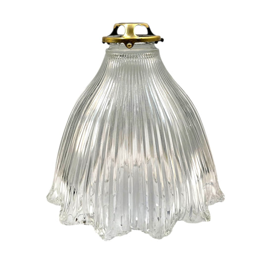 Clear ribbed glass pendant light with brass fitting on a white background