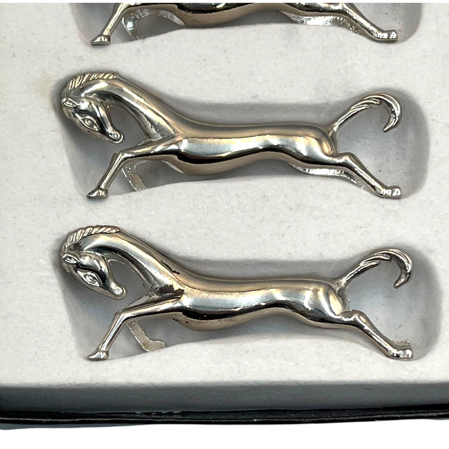 Set of 6 French silver plated horse shaped knife rests 