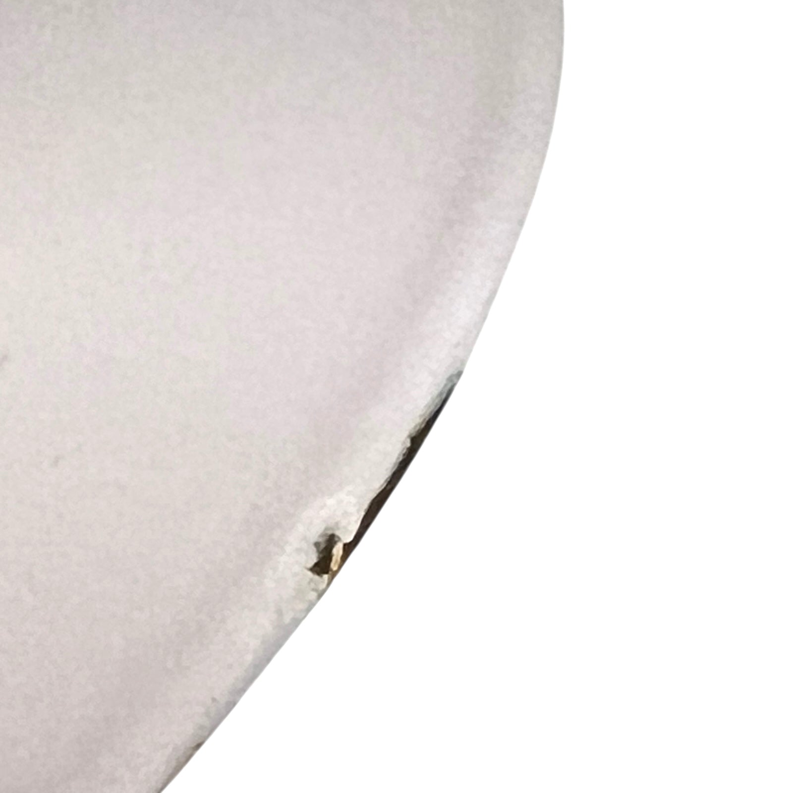 Close up of a Le Creuset pot on a white background