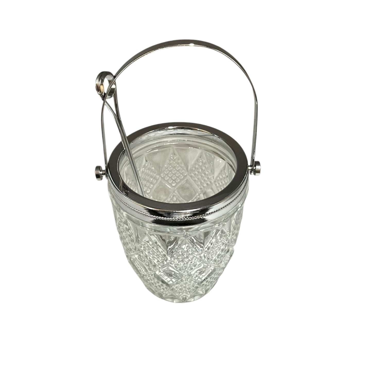 Clear glass ice bucket with silver scoop and handle on a white background