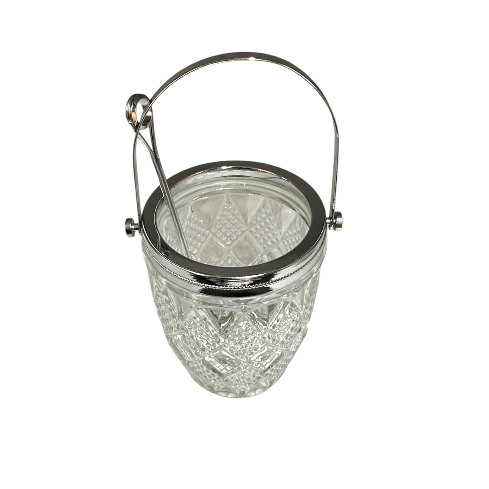 Clear glass ice bucket with silver scoop and handle on a white background