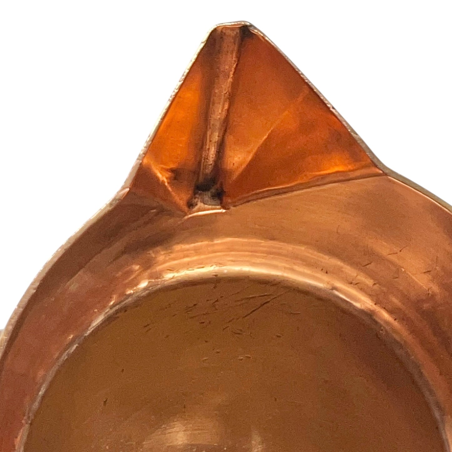 spout of copper sugar pan