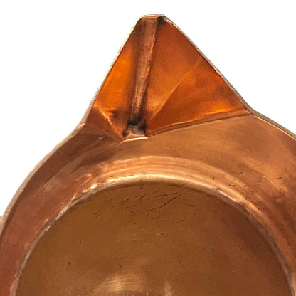spout of copper sugar pan