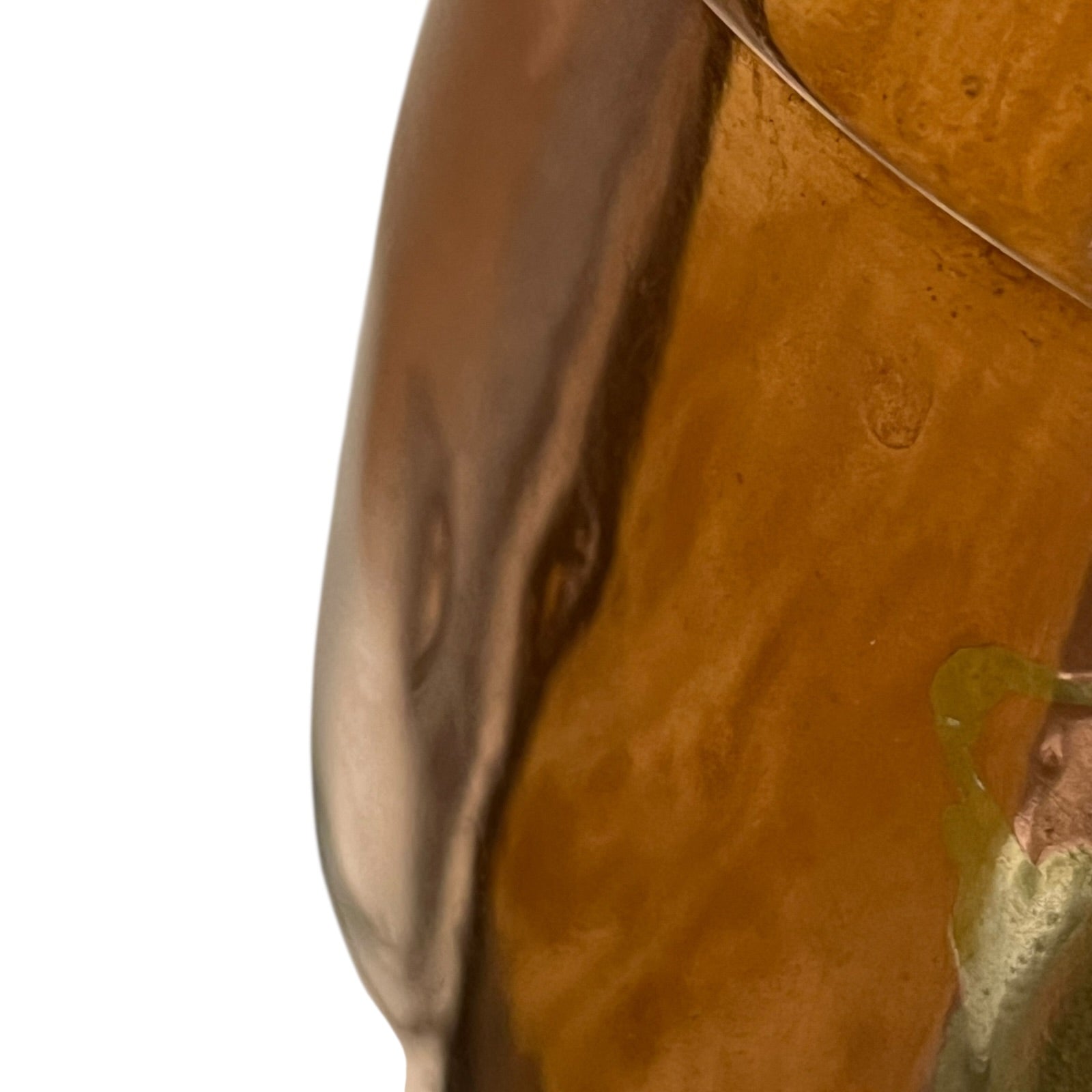 Close up of a copper cooking pot stockpot with handles on a white background