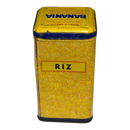 Yellow tin box with 'Riz' branding on a white background