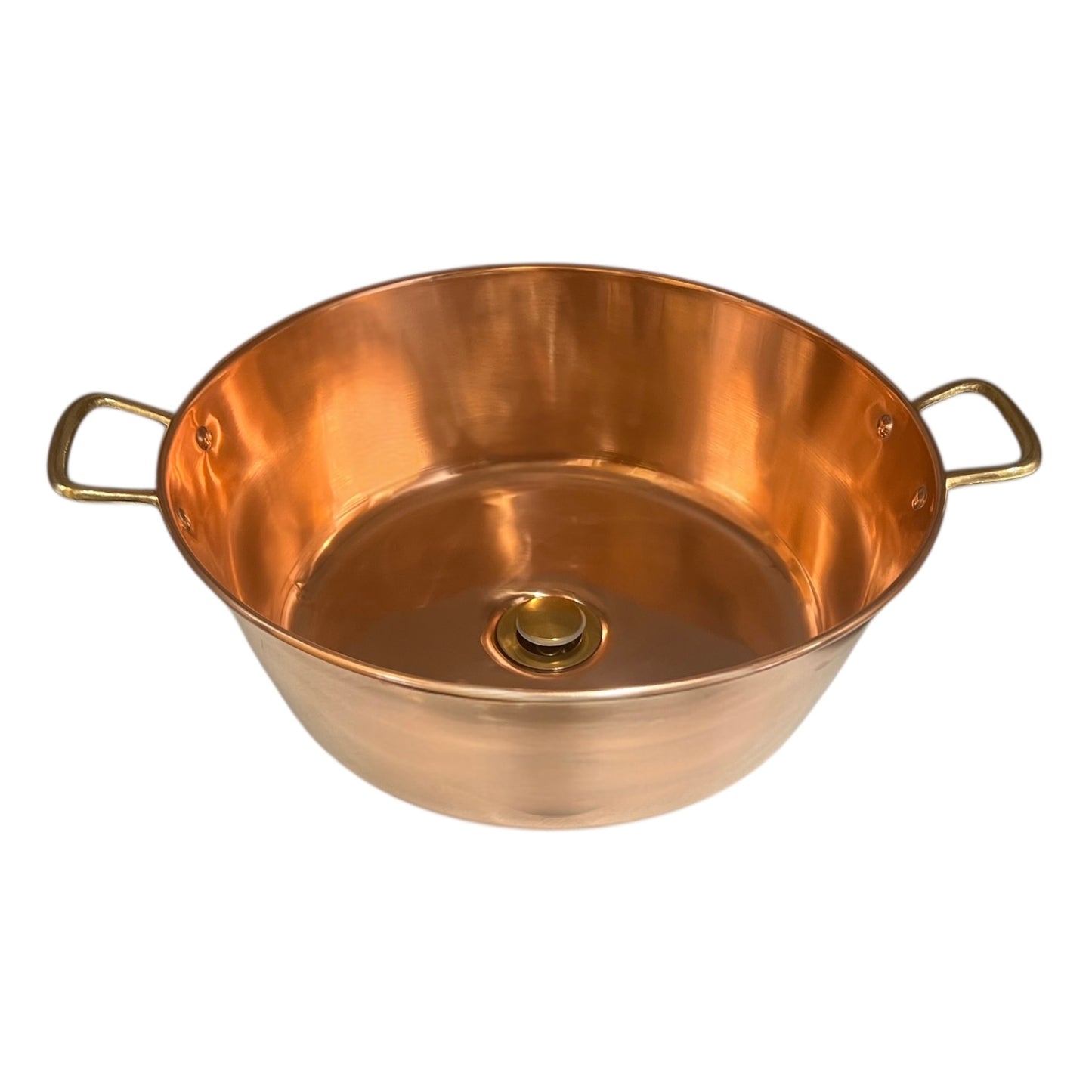 Copper sink with brass handles on a white background