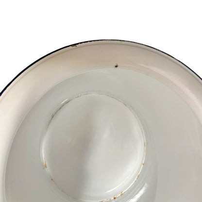 Close up of a vintage enamel lidded white bucket on a white background