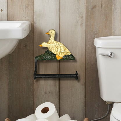Decorative toilet paper holder shaped like a goose in a bathroom setting.