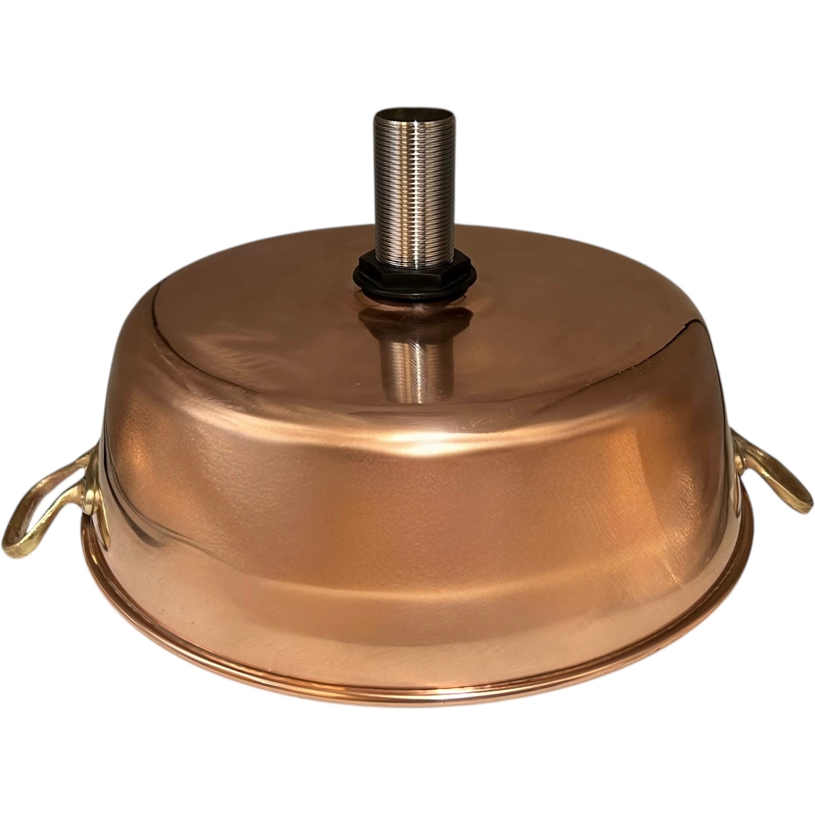 Close up of a copper basin sink on a white background