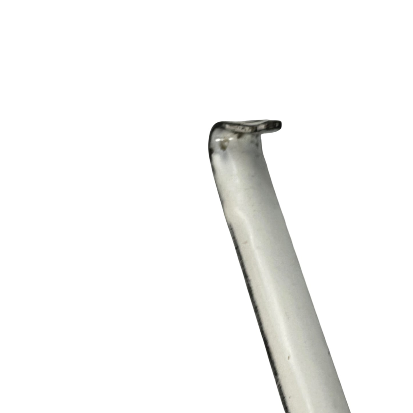 close up of a vintage kitchen utensil on a white background