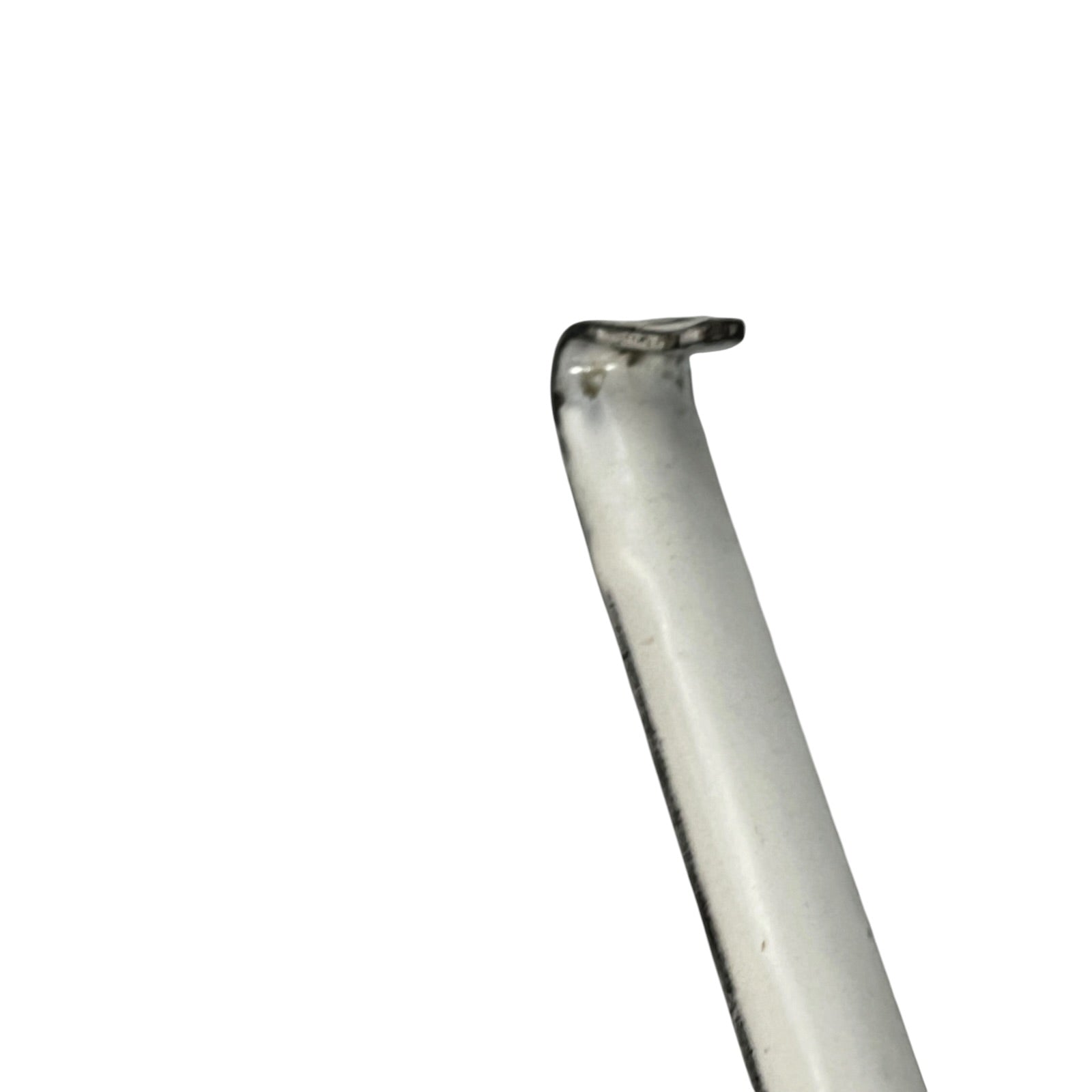 close up of a vintage kitchen utensil on a white background
